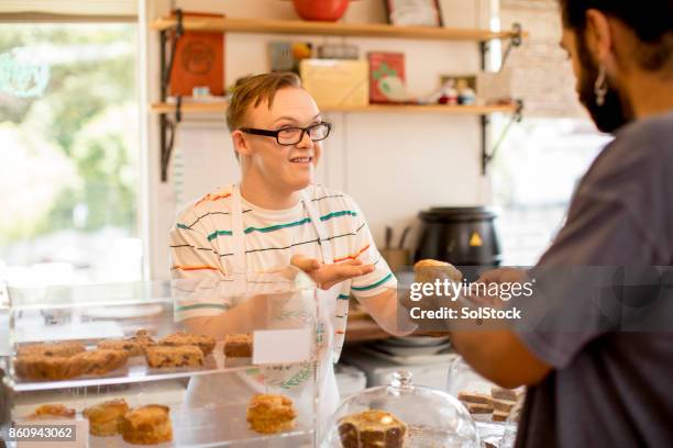 serving food at the farm - sweet charity stock pictures, royalty-free photos & images