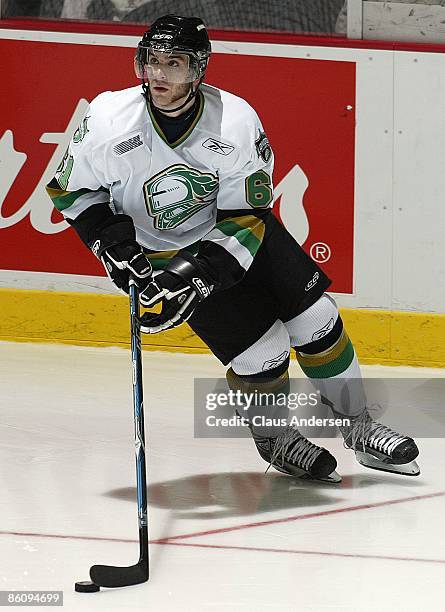 John Tavares of the London Knights skates with the puck in Game Three of the Western Conference Championship against the Windsor Spitfires on April...