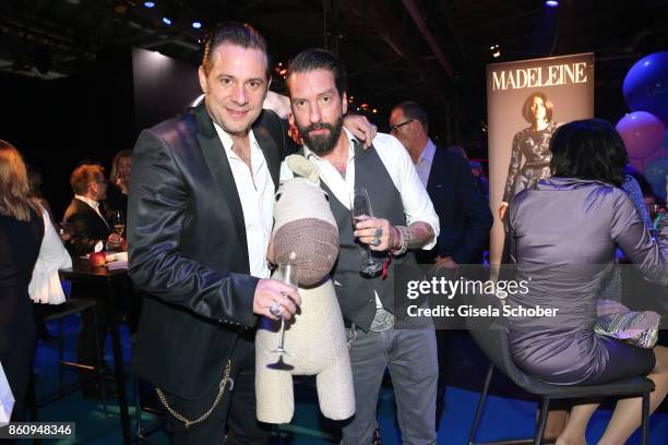 Sascha Vollmer and Alec Voelkel, singer of the band "Boss Hoss" during the 'Tribute To Bambi' gala at Station on October 5, 2017 in Berlin, Germany.