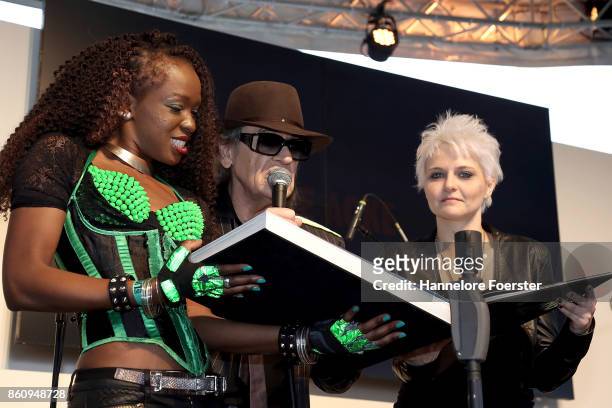 Singer Udo Lindenberg pose with photographer Tine Acke for a photo during the presentation of a book about his life at the 2017 Frankfurt Book Fair...