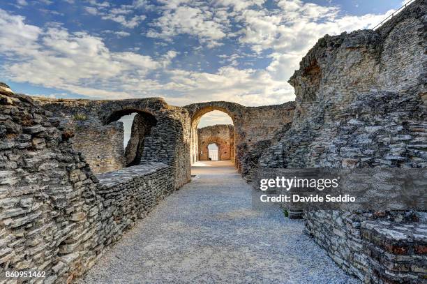 romans ruins at the grottoes of catullus - sirmione fotografías e imágenes de stock