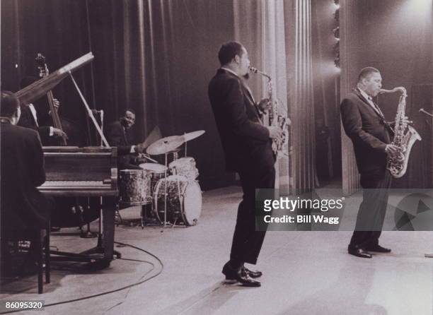 Photo of John COLTRANE and Elvin JONES and Eric DOLPHY, L-R Elvin Jones , Eric Dolphy and John Coltrane performing on stage