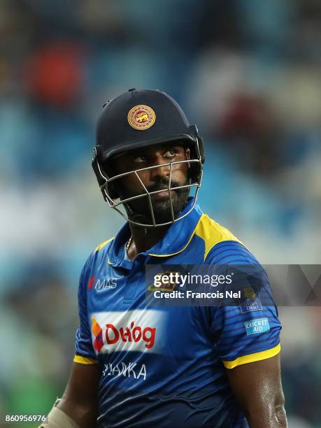 Thisara Perera of Sri Lanka leave the field after being dismissed by Shadab Khan of Pakistan during the first One Day International match between...