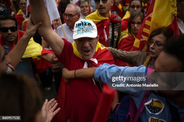 Thousands gather in Barcelona for a Spanish National Day Rally on October 12, 2017 in Barcelona, Spain. Spain marked its National Day with a show of...