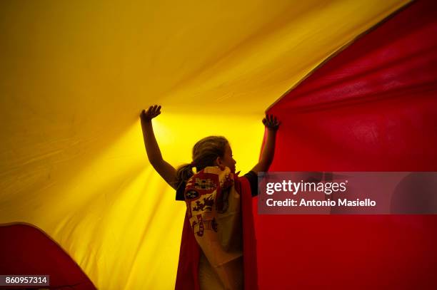 Thousands gather in Barcelona for a Spanish National Day Rally on October 12, 2017 in Barcelona, Spain. Spain marked its National Day with a show of...