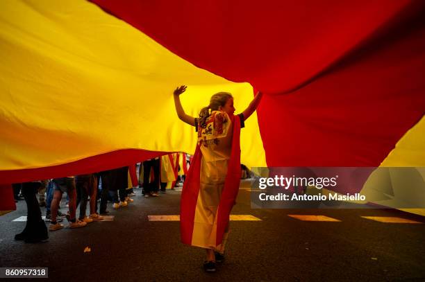 Thousands gather in Barcelona for a Spanish National Day Rally on October 12, 2017 in Barcelona, Spain. Spain marked its National Day with a show of...