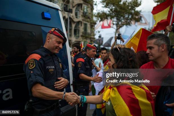 Thousands gather in Barcelona for a Spanish National Day Rally on October 12, 2017 in Barcelona, Spain. Spain marked its National Day with a show of...