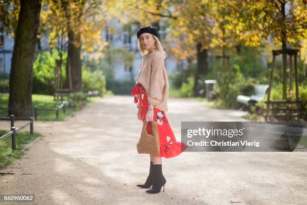 Sonia Lyson wearing brown Loeffler Randall teddy fake fur bag, red ruffled skirt Gannix x Anita Hass, oversized cashmere sweater Zara, black sock...