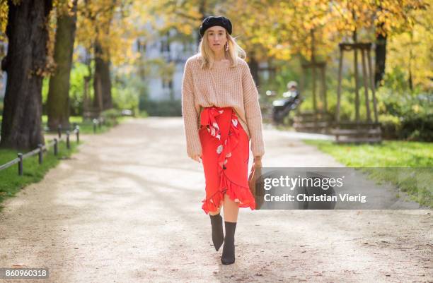 Sonia Lyson wearing brown Loeffler Randall teddy fake fur bag, red ruffled skirt Gannix x Anita Hass, oversized cashmere sweater Zara, black sock...