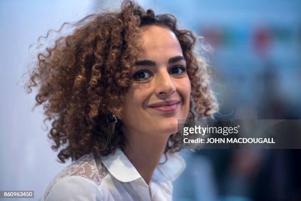French-Moroccan writer Leila Slimani poses during a talk at the Frankfurt Book Fair on October 13, 2017 in Frankfurt am Main, western Germany. France...