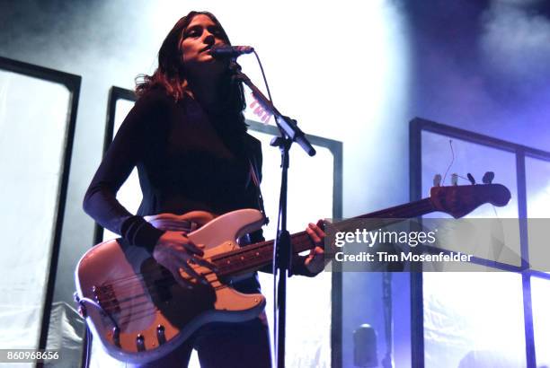 Theresa Wayman of Warpaint performs during the "Global Spirit Tour" at ORACLE Arena on October 10, 2017 in Oakland, California.