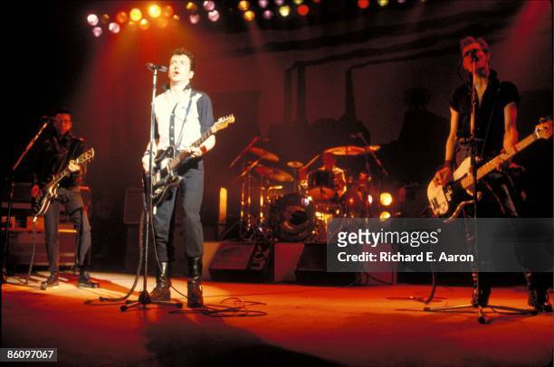 Photo of Mick JONES and CLASH and Joe STRUMMER and Paul SIMONON, L-R: Mick Jones, Joe Strummer, Paul Simonon performing live onstage