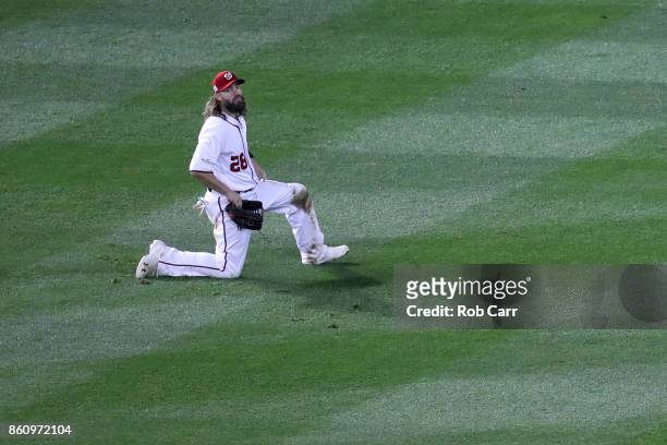 Jayson Werth of the Washington Nationals looks on after committing an error allowing a run to score against the Chicago Cubs during the sixth inning...