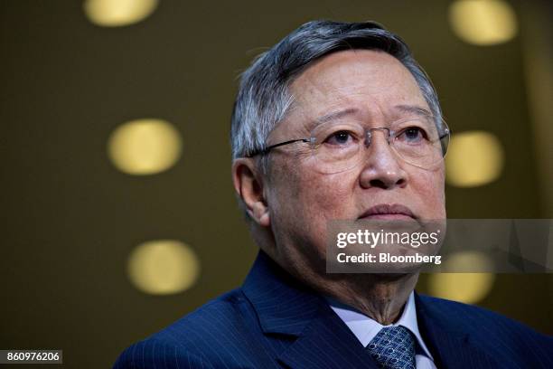 Carlos Dominguez, Philippines' secretary of finance, listens during a Bloomberg Television interview at the International Monetary Fund and World...