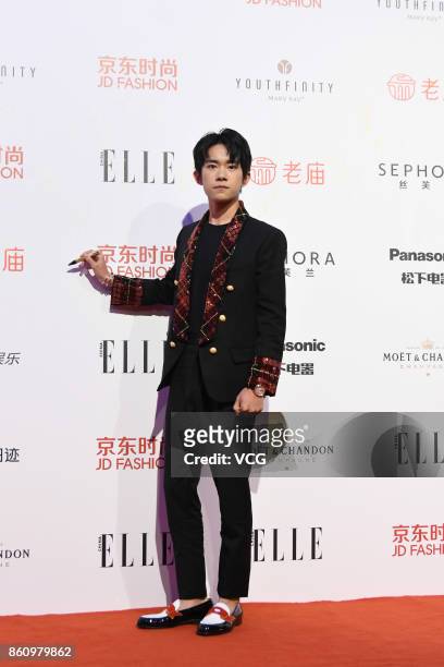 Singer Jackson Yi arrives at red carpet for the ELLE Style Awards at Shanghai Exhibition Center on October 13, 2017 in Shanghai, China.