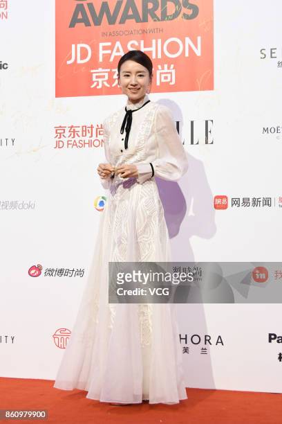 Actress Dong Jie arrives at red carpet for the ELLE Style Awards at Shanghai Exhibition Center on October 13, 2017 in Shanghai, China.