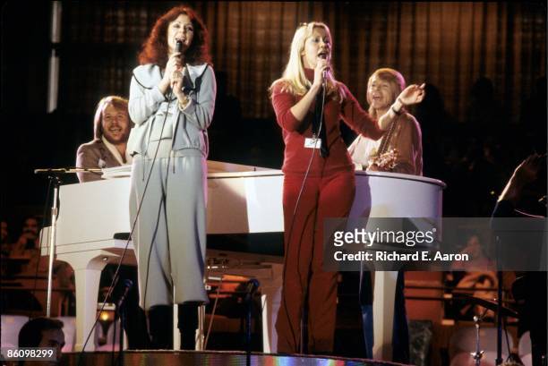 Photo of ABBA; L-R: Benny Andersson, Anni-Frid Lyngstad, Agnetha Faltskog, Bjorn Ulvaeus - performing live onstage Unicef Gala - group shot