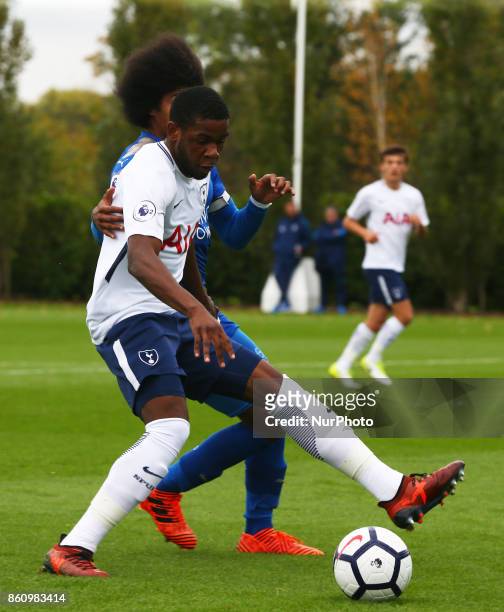 Japhet Tanganga of Tottenham Hotspur Under 23s holds of Hamza Choudhury of Leicester City Under 23s during Premier League 2 Div 1 match between...