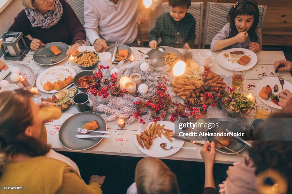 Multi-generation family at a dinner party