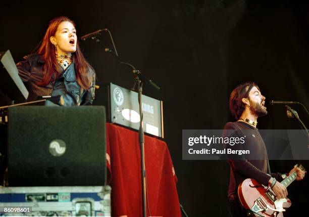 30th JUNE: Zia McCabe and Courtney Taylor-Taylor from The Dandy Warhols perform live on stage at Parkpop in The Hague on 30th June 2002.