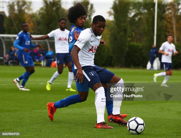 Japhet Tanganga of Tottenham Hotspur Under 23s holds of Hamza Choudhury of Leicester City Under 23s during Premier League 2 Div 1 match between...