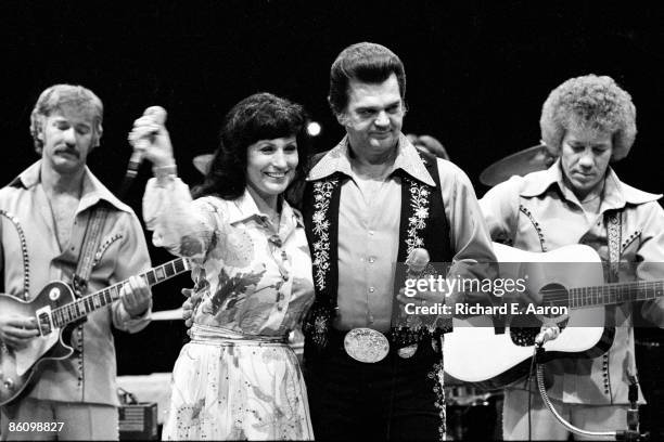 Photo of Conway TWITTY and Loretta LYNN; with Conway Twitty