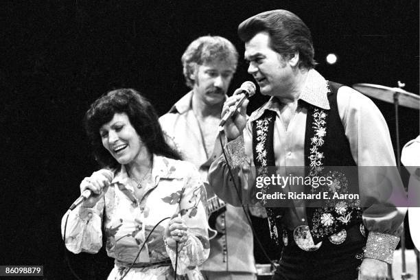 Photo of Conway TWITTY and Loretta LYNN; with Conway Twitty