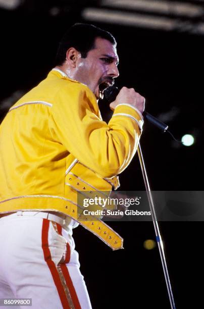 Freddie Mercury of Queen performs on stage on the Magic Tour at Wembley Stadium, London, July 1986.