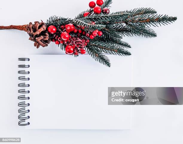 mockup notepad with christmas  pine tree on white background - man in suit white background stock-fotos und bilder