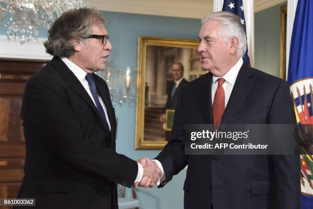Secretary of State Rex Tillerson welcomes Organization of American States Secretary General Luis Almagro before their meeting on October 13,2017 at...