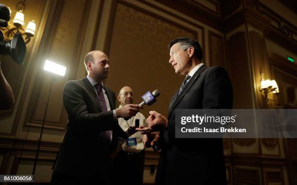 Nevada Gov. Brian Sandoval speaks members of the media during the National Clean Energy Summit 9.0 on October 13, 2017 in Las Vegas, Nevada.