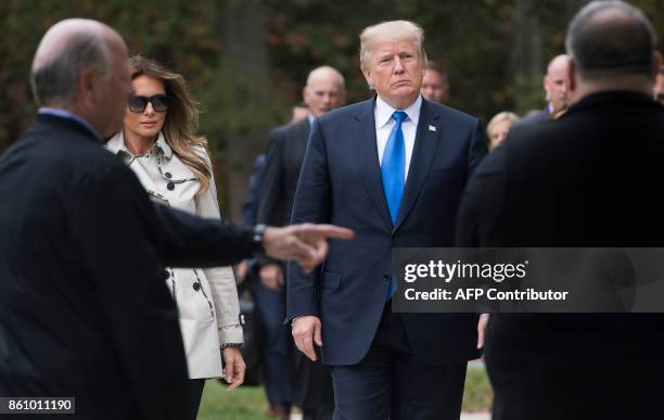 President Donald Trump and First Lady Melania Trump arrive to watch a K-9 dog demonstration at the United States Secret Service James J. Rowley...