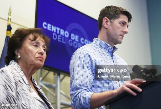 House Speaker Paul Ryan , R, listens to a question as Rep. Nita Lowey looks on at a press conference on October 13, 2017 in San Juan, Puerto Rico....