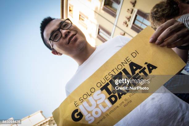 People stage a protest in support of the IUS SOLI law pro citizenship for children of migrants, outside the Italian Parliament on 13 October 2017 in...