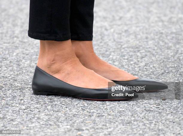 First lady Melania Trump shoes as she accompanies her husband, United States President Donald J. Trump, on a tour the U.S. Secret Service James J....