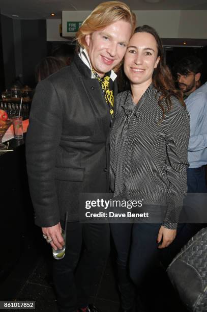 Henry Conway and Cressida Pollock attend the "Walk With Me" party sponsored by Martin Millers Gin at The Den, 100 Wardour St, on October 13, 2017 in...