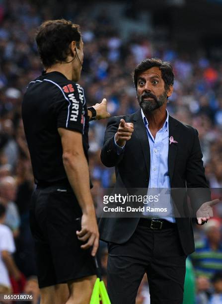 Head coach Quique Sanchez Flores of RCD Espanyol argues with the assistant referee after Gerard Moreno of RCD Espanyol scored a disallowed goal...