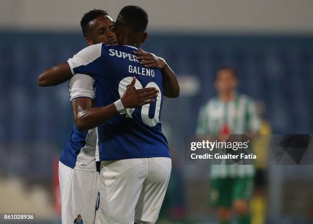 Porto forward Wenderson Galeno from Brazil celebrates with teammate FC Porto forward Hernani Fortes from Portugal after scoring a goal during the...