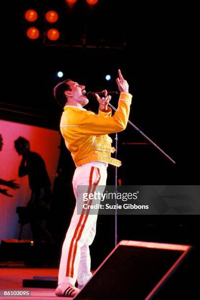 Freddie Mercury of Queen performs on stage on the Magic Tour at Wembley Stadium, London, July 1986.