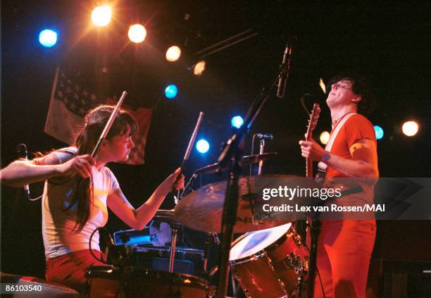 Photo of Jack WHITE and Meg WHITE and WHITE STRIPES; Meg and jack White performing on stage