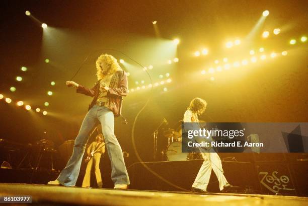 Photo of Jimmy PAGE and Robert PLANT and LED ZEPPELIN, L-R: Robert Plant, John Paul Jones , Jimmy Page performing live onstage during the 1977 US tour