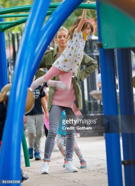 Sienna Miller and daughter Marlowe Sturridge are seen on October 13, 2017 in New York City.