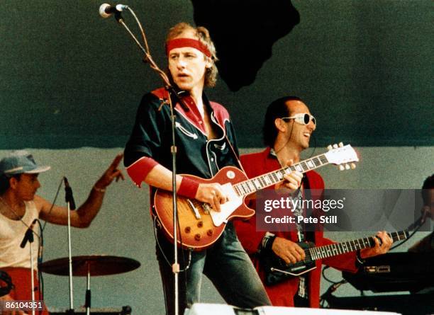 Photo of Mark KNOPFLER and DIRE STRAITS and LIVE AID and Jack SONNI, Mark Knopfler and Jack Sonni performing live onstage at Live Aid