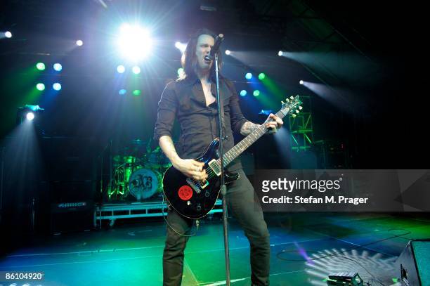 Photo of ALTER BRIDGE and Myles KENNEDY, Myles Kennedy performing on stage