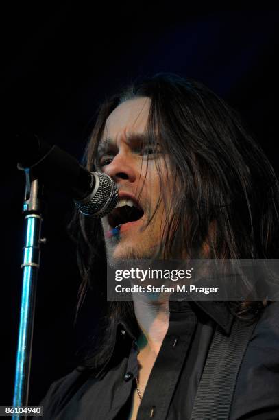 Photo of ALTER BRIDGE and Myles KENNEDY, Myles Kennedy performing on stage