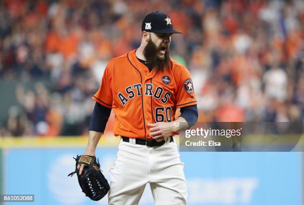 Dallas Keuchel of the Houston Astros reacts after striking out Aaron Judge of the New York Yankees to end the top of the third inning during game one...