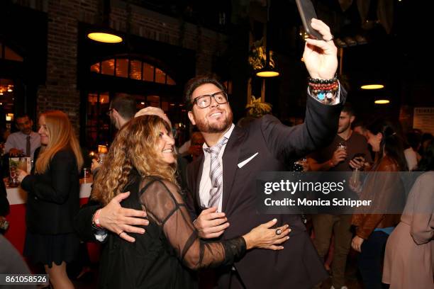 Chef Scott Conant poses for a selfie with guests during Aperitivo! hosted by Scott Conant at The Standard High Line on October 13, 2017 in New York...