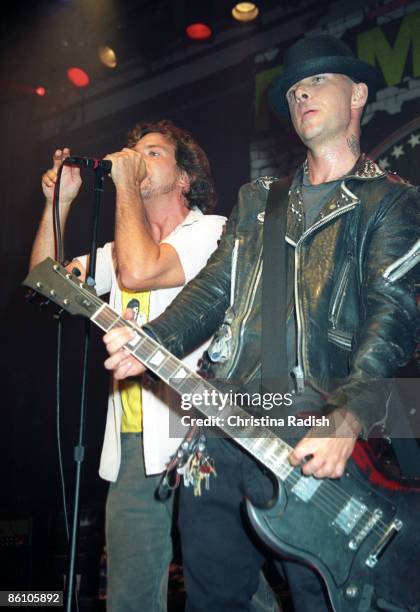 Photo of Eddie VEDDER, Pearl Jam singer Eddie Vedder & Rancid singer Tim Armstrong performing at the Ramones 30th Anniversary concert held at The...