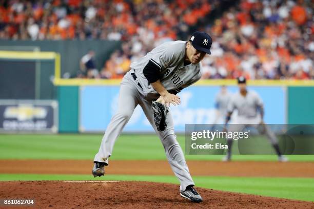 Masahiro Tanaka of the New York Yankees is hit by a ball off of the bat of Josh Reddick of the Houston Astros in the sixth inning during game one of...