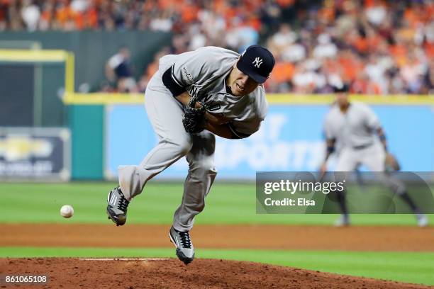 Masahiro Tanaka of the New York Yankees is hit by a ball off of the bat of Josh Reddick of the Houston Astros in the sixth inning during game one of...